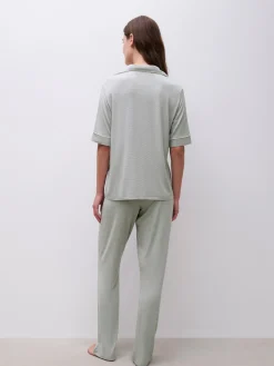 Femilet CHELSEA Lange broek - Oil blue / Egret